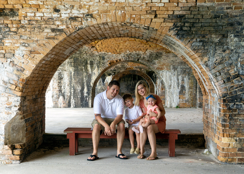 family at fort pickens arches