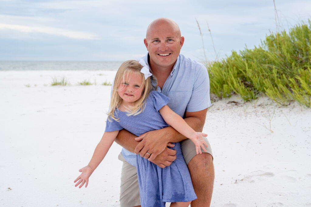 dad and daughter on beach
