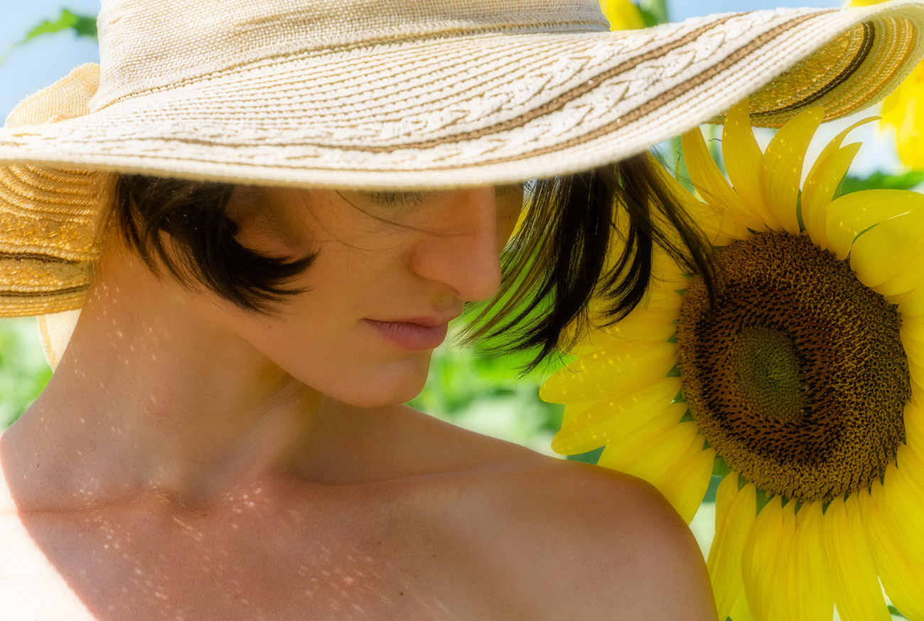 A woman with a hat on her head