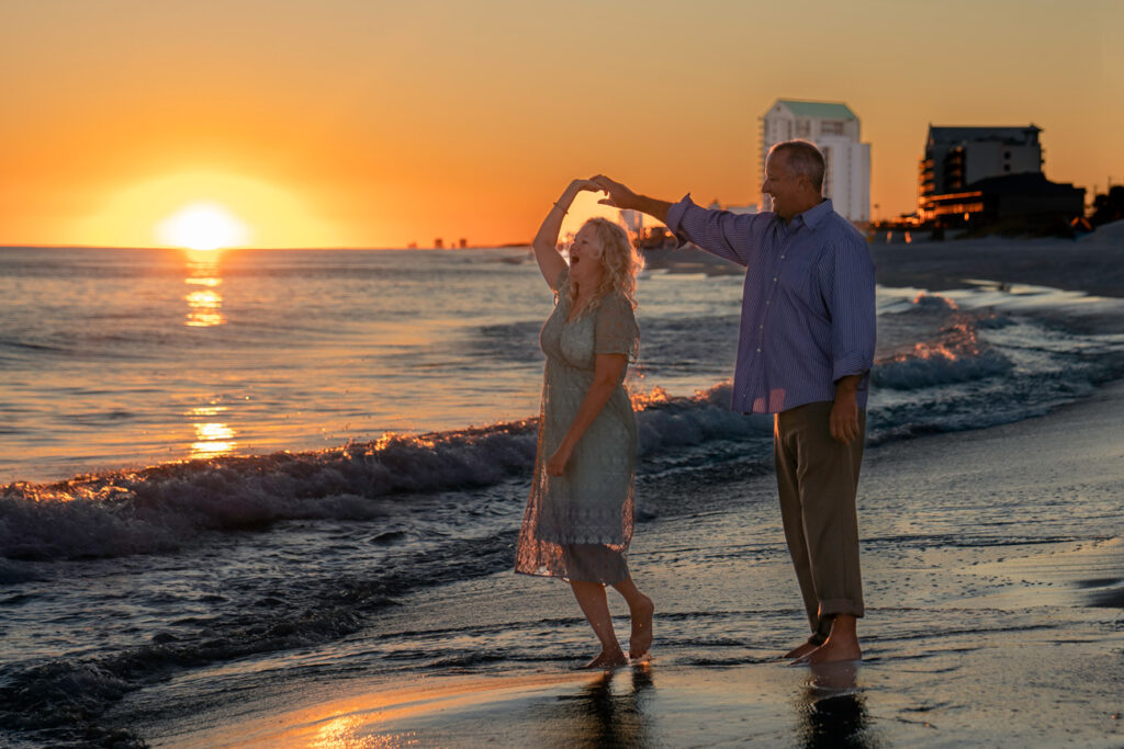 couple dancing at sunset on navarre beach