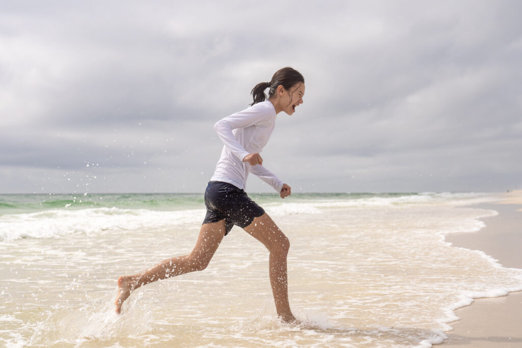 girl running in beach