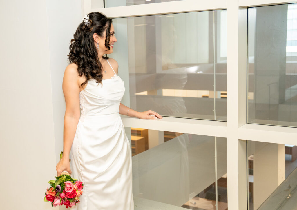 bride-portrait-against-glass-wall